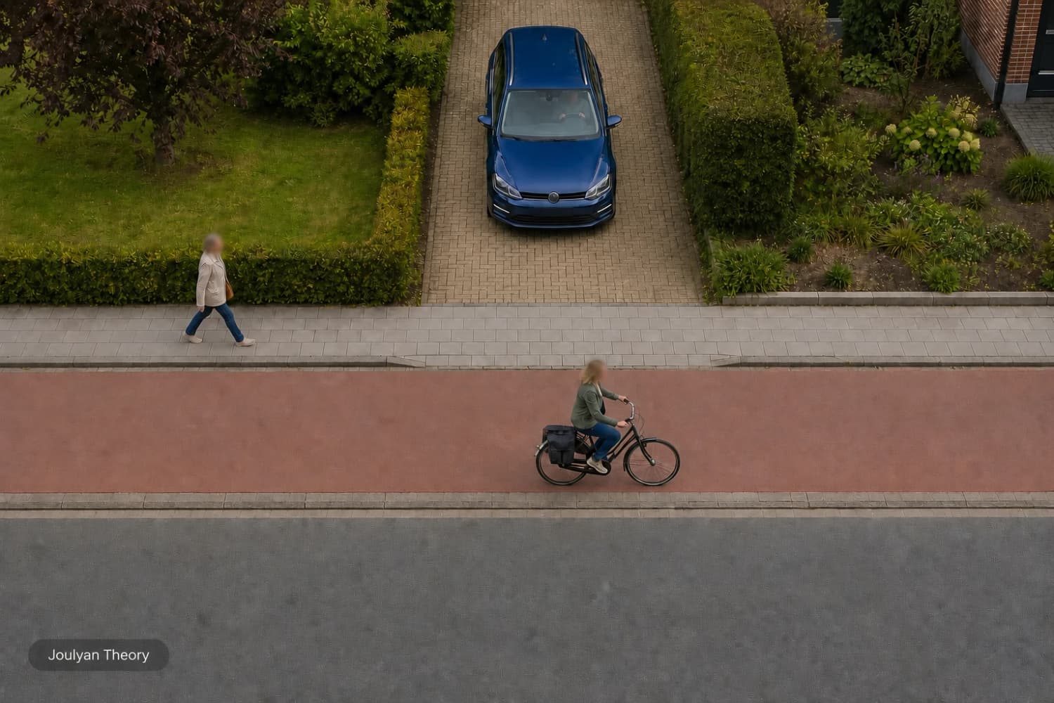 Car waits at an exit while a pedestrian and cyclist use the continuing path