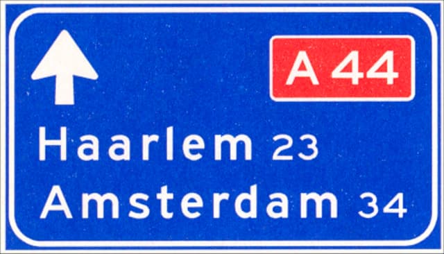 Motorway direction sign for through traffic